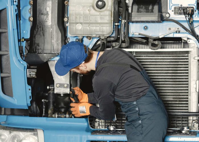 man-with-tools-truck-worker-uniform-faulty-truck_Easy-Resize.com